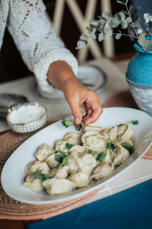 Plate of chicken russian dumplings by Daa! Dumplings NYC